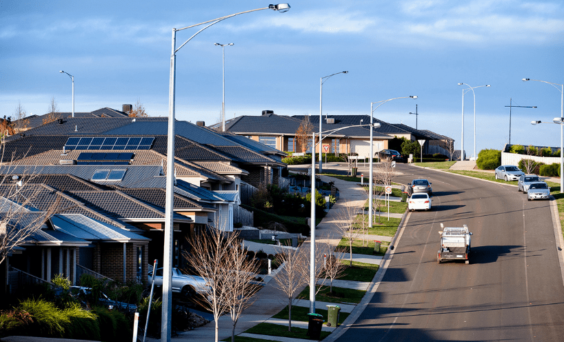 Street with houses with solar panels installed